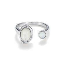 Load image into Gallery viewer, Silver adjustable open mother-of-pearl ring featuring iridescent shell accents and a fluid sculptural band for a contemporary look.