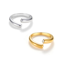 Load image into Gallery viewer, Gold adjustable open cuff ring with two cubic zirconia stones at each end, modern minimalist double CZ band design. Silver adjustable open ring featuring dual cubic zirconia tips, sleek minimalist cuff style band.