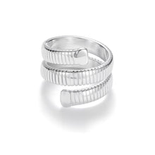 Load image into Gallery viewer, Silver spiral coil wrap ring with ribbed serpentine band and modern sculptural design.