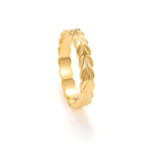 Load image into Gallery viewer, Dainty gold leaf ring with continuous leaf motif, thin botanical band shown in angled side view