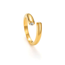 Load image into Gallery viewer, Gold adjustable open cuff ring with two cubic zirconia stones at each end, modern minimalist double CZ band design.