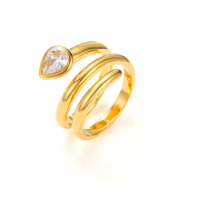 Load image into Gallery viewer, Gold snake wrap ring with sculptural coiled band and pear-shaped teardrop cubic zirconia stone, modern serpent statement jewelry.