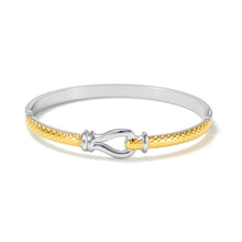 Load image into Gallery viewer, Two-Tone Equestrian Buckle Hinged Bangle Bracelet with a textured mixed metal band and signature buckle clasp, inspired by classic equestrian style.