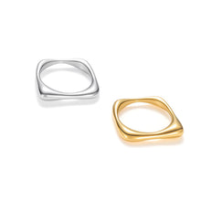 Load image into Gallery viewer, Modern minimalist gold sculptural wave band ring with fluid organic curves and asymmetrical contour design. Modern minimalist silver sculptural wave band ring featuring fluid organic curves and abstract asymmetrical silhouette.
