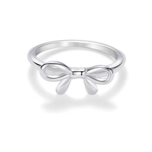 Load image into Gallery viewer, Minimalist silver bow ring featuring a delicate ribbon bow design on a slim band.
