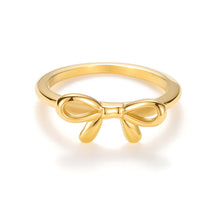 Load image into Gallery viewer, Minimalist gold bow ring with delicate ribbon knot design and polished band.
