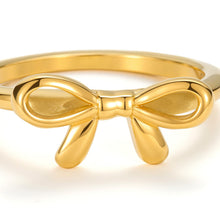 Load image into Gallery viewer, Minimalist gold bow ring with delicate ribbon knot design and polished band.
