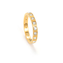 Load image into Gallery viewer, Dainty gold eternity ring with square cut CZ stones, thin geometric gold stacking band shown in angled view
