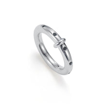 Load image into Gallery viewer, Silver band ring with black cubic zirconia stones, designed with a sleek rounded profile and subtle CZ accents for a modern, minimalist style.

