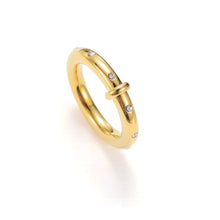 Load image into Gallery viewer, Gold band ring with white cubic zirconia stones, featuring a smooth polished finish and evenly spaced CZ details for a modern minimalist look.
