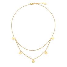 Load image into Gallery viewer, Layered Flower Charm Necklace featuring daisy-inspired floral charms cascading across two delicate gold chains in a minimalist layered design.
