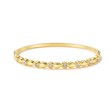 Load image into Gallery viewer, Teardrop Cubic Zirconia Hinged Bangle Bracelet featuring alternating polished teardrop links and sparkling cubic zirconia in a minimalist design.
