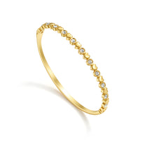 Load image into Gallery viewer, Heart Cubic Zirconia Hinged Bangle Bracelet with alternating heart motifs and brilliant cubic zirconia stones in an elegant gold-tone finish.
