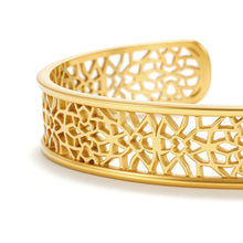 Load image into Gallery viewer, Close-up of the Arabesque Lace Open Cuff Bracelet featuring intricate filigree cutouts, geometric mosaic patterns, and a polished gold finish.
