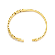 Load image into Gallery viewer, Open dewdrop Cubic Zirconia Hinged Bangle Bracelet showing the secure hinge clasp, polished interior, and elegant stackable bracelet design.
