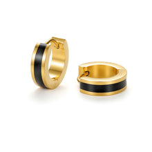 Load image into Gallery viewer, Black enamel huggie hoop earrings with a polished gold finish, showcasing a modern minimalist hoop design.
