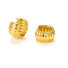 Load image into Gallery viewer, Gold Bead Edge Bubble Huggie Hoop Earrings with a chunky wide profile, polished finish, bead-edge detailing, and sculptural ribbed bubble design.
